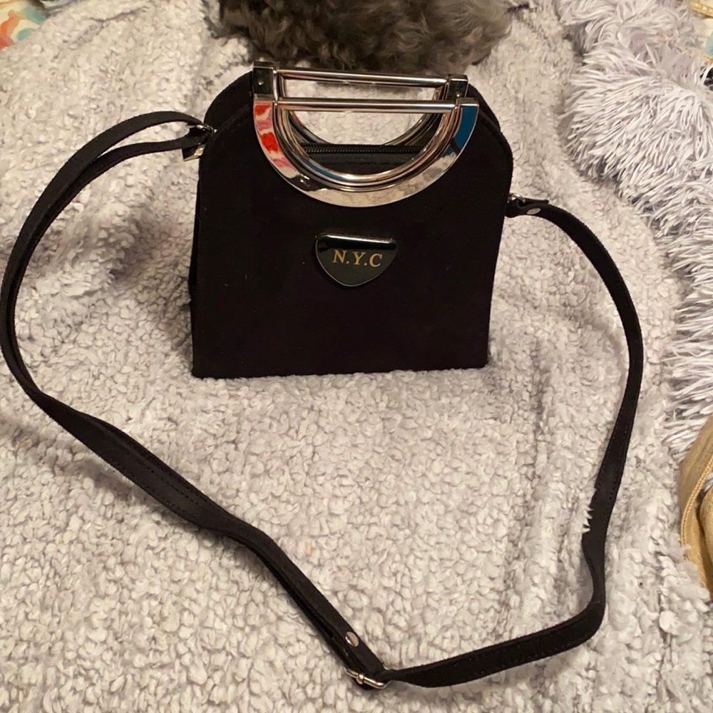 NYC fashion handbag with metal handles